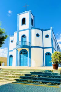 A church with blue and white trim on the front