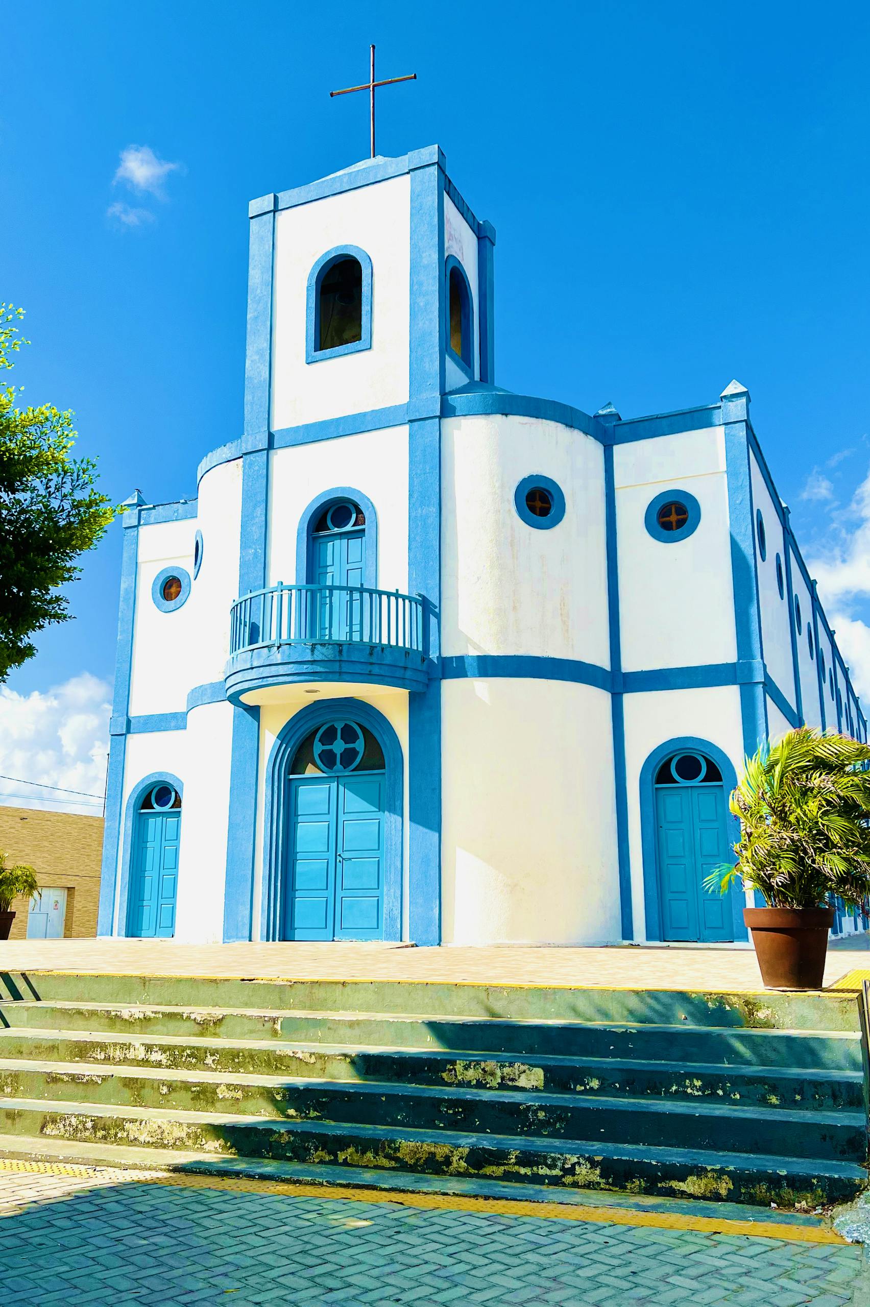 A church with blue and white trim on the front