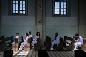 People Sitting on Church Pews