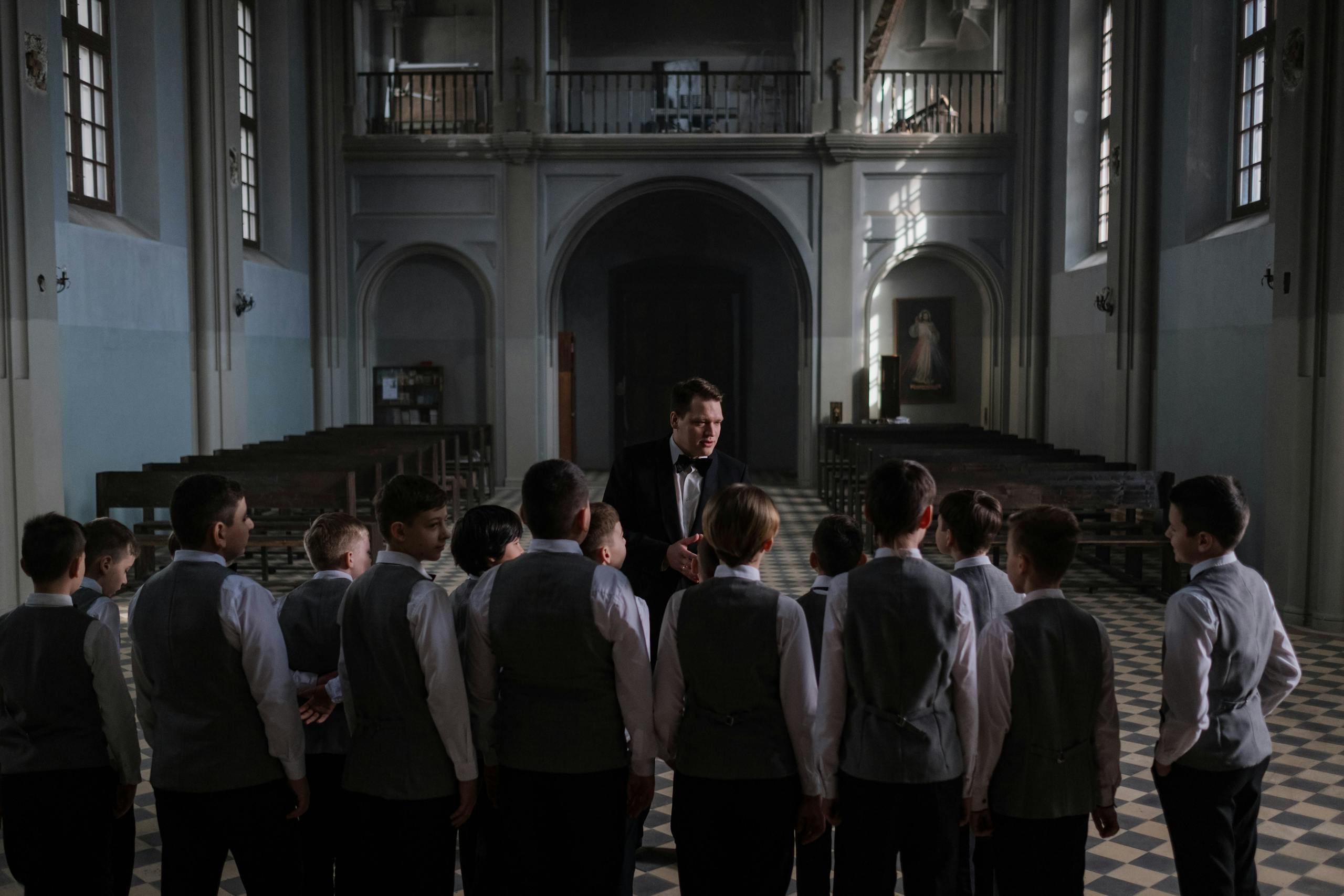 Photo of a Boy Choir Practising in Church