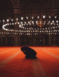 Man Praying in Mosque